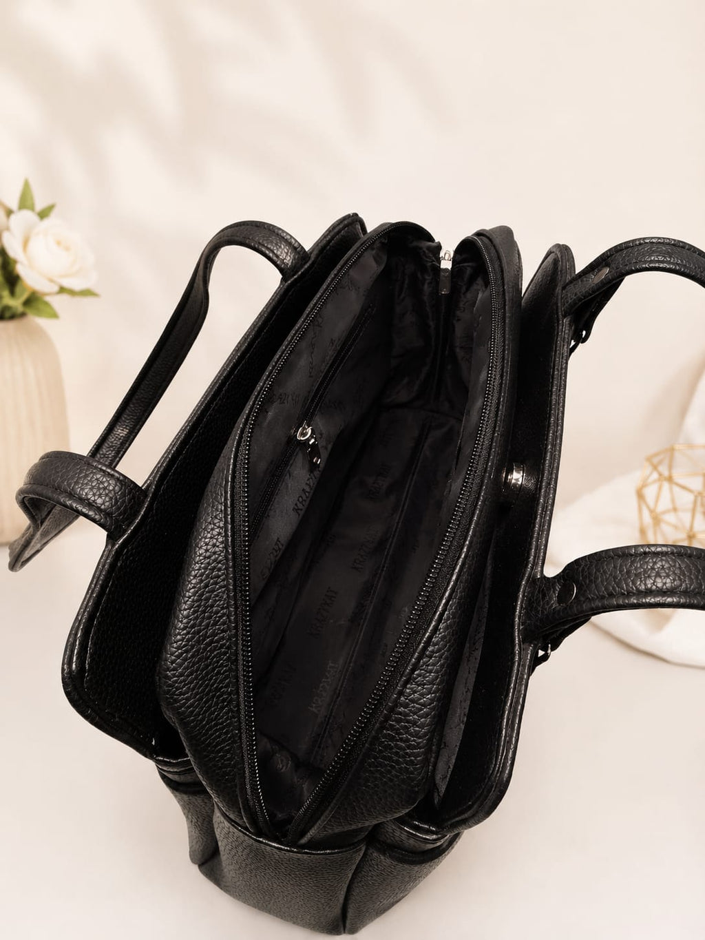 Black pebbled leather shoulder bag – back view